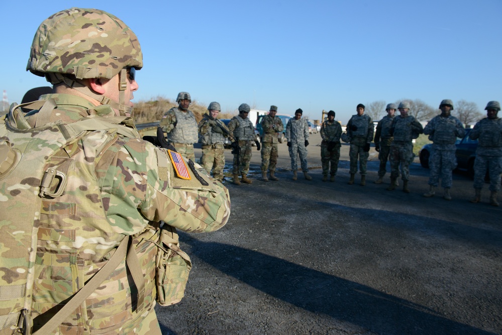 MP Teaches Signal Soldiers How to Search a Vehicle and an Individual