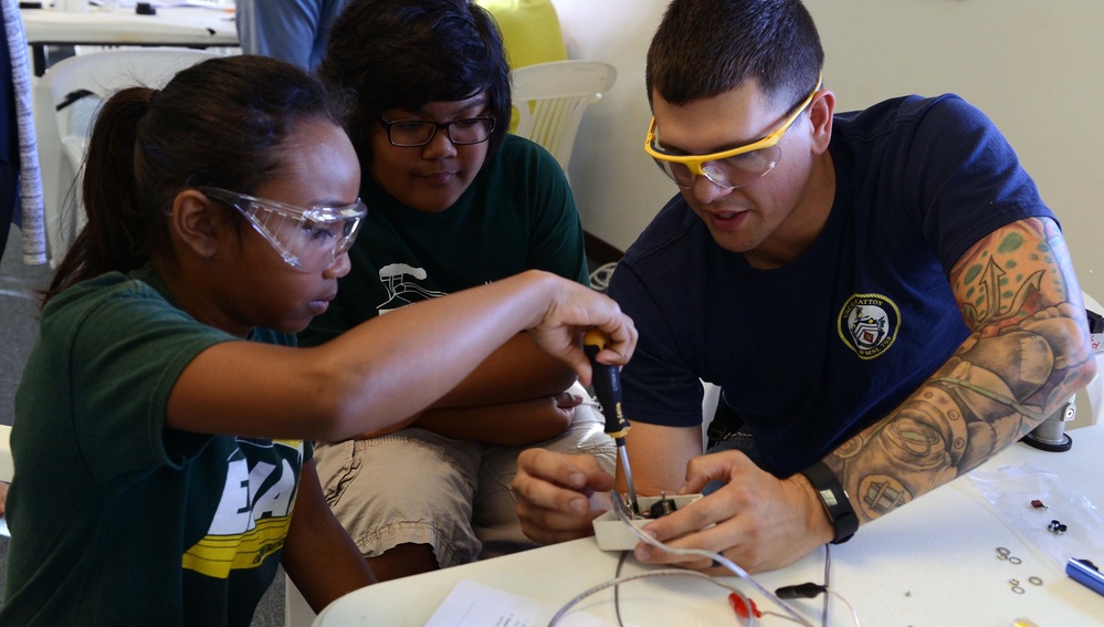 Coast Guard volunteers help students build SeaPerch underwater robots