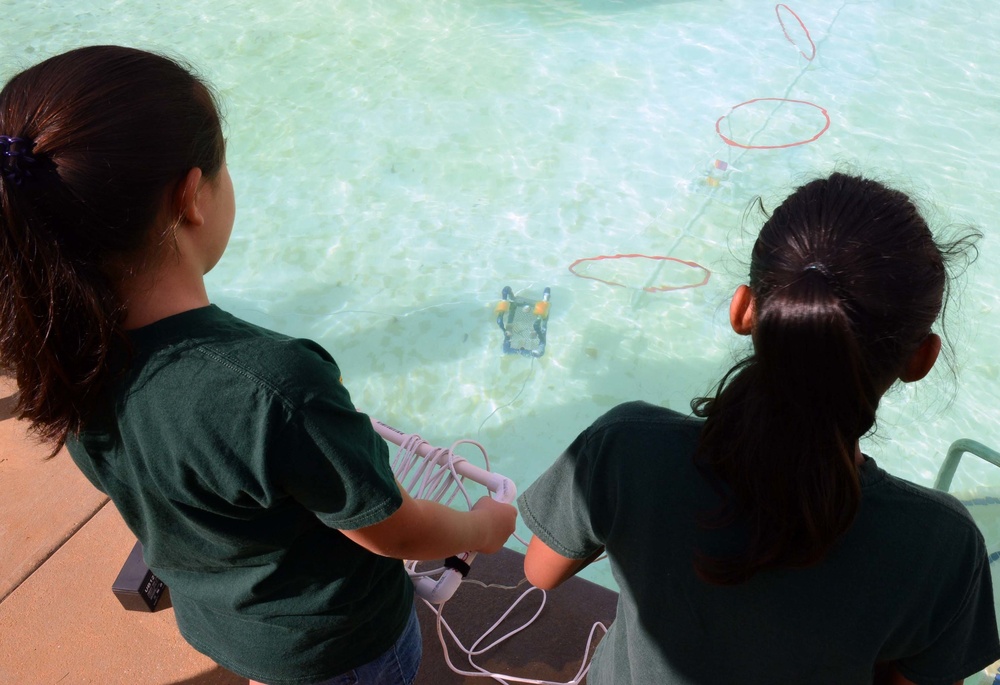 Coast Guard volunteers help students build SeaPerch underwater robots