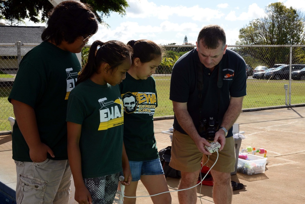 Coast Guard volunteers help students build SeaPerch underwater robots