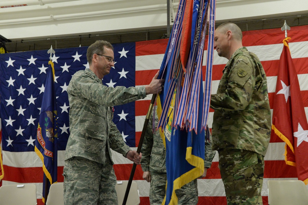 Col. Thomas “Britt” Hatley assumes the command of the 119th Wing