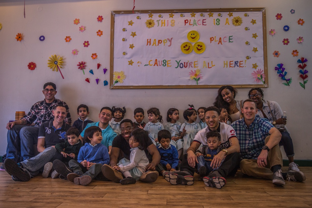 Marines and Sailors volunteer at the Regional Institute of Active Learning in Manama