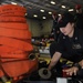 Nimitz Sailor lays out equipment