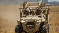 Off-road, expeditionary all-terrain vehicles on their way to infantry Marines