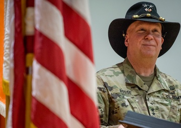 Maj. Gen. Bosse and flags