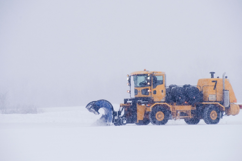 109th Airlift Wing clears snow from runway