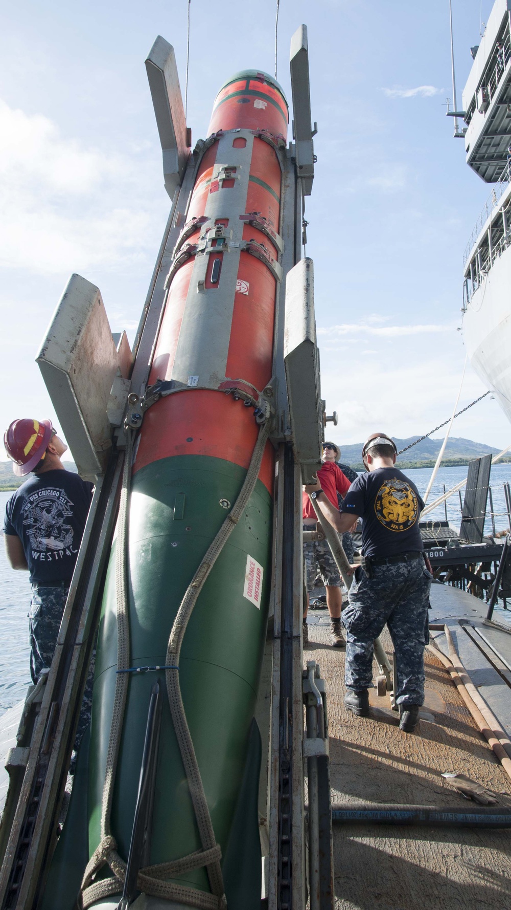 USS Chicago Sailors Raise EXTORP During Ordnance Transfer Feb. 10