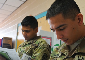 86th ESB Soldiers judge elementary school science fair