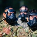 Soldiers from Headquarters and Headquarters Company, 301st Maneuver Enhancement Brigade, prepare to enter a mask confidence chamber