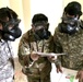 Soldiers from Headquarters and Headquarters Company, 301st Maneuver Enhancement Brigade, read a series of phrases to ensure the fit and breathability of the M50 Joint Service General Purpose Mask