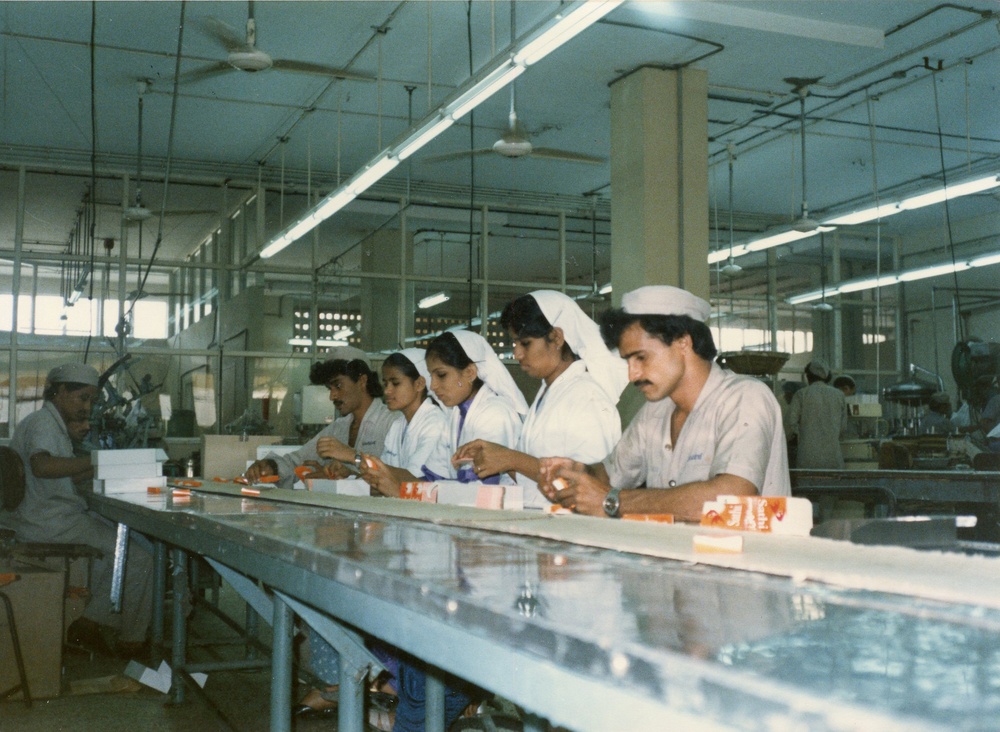 Plant workers at Woodward Factory in Karachi