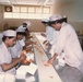 Plant workers at Woodward Factory in Karachi