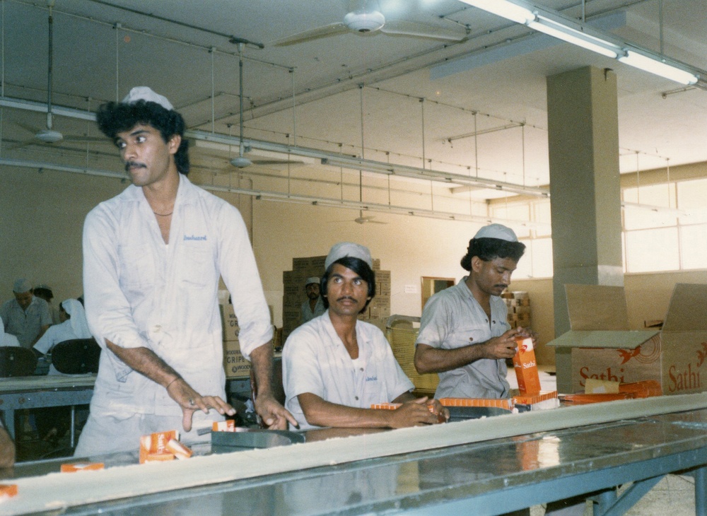 Plant workers at Woodward Factory in Karachi