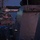 170215-N-KP948-011 A twilight/dusk scene at a naval port showing multiple U.S. Navy warships moored alongside a pier. The name 'CARNEY' is visible on the hull of one destroyer, and an American flag is flying from its stern. The image is taken from the deck or superstructure of an adjacent vessel, providing an elevated perspective looking down the pier.