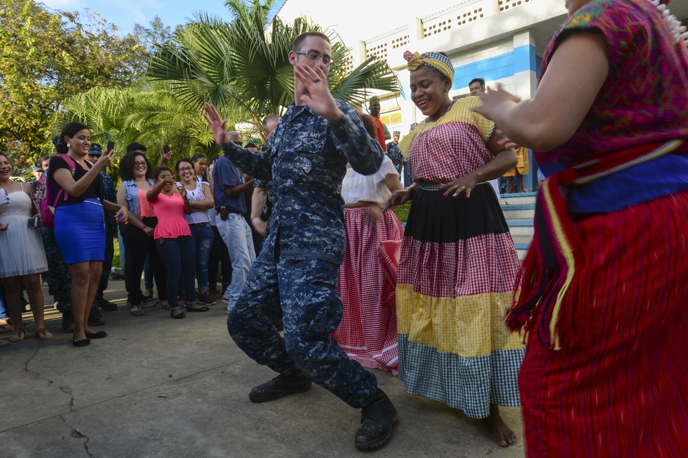 Hospital Corpsman 3rd Class Daniel Anderson  dances with host nation residents during closing ceremonies in support of Continuing Promise 2017