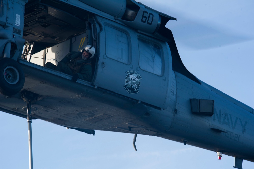 USS America conducts ammunition on-load.