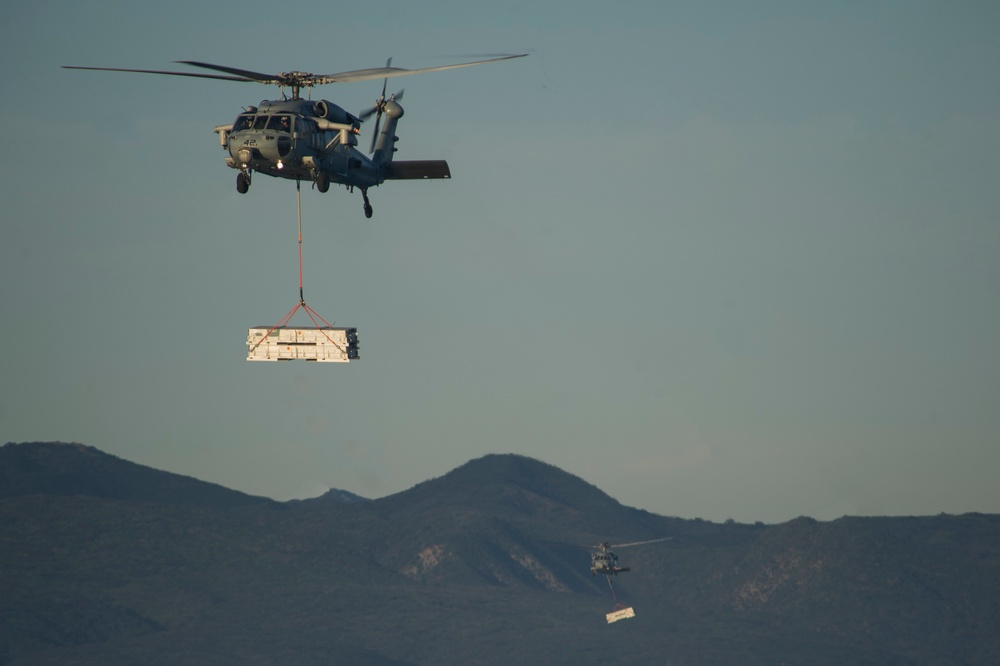 USS America conducts ammunition on-load.