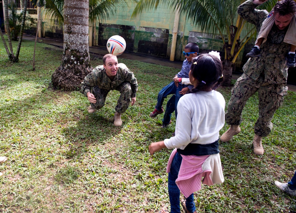 Lt. Martin Bunt plays soccer with host nation patients at the Continuing Promise 2017 (CP-17) medical site