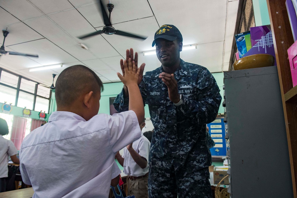Green Bay Sailors participate in a cultural exchange at the Wat Samnak Thon Elementary School during Cobra Gold 2017