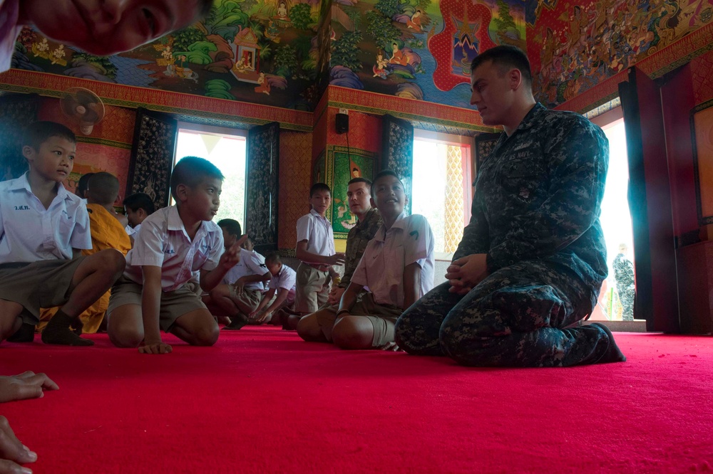 Green Bay Sailors participate in a cultural exchange at the Wat Samnak Thon Elementary School during Cobra Gold 2017