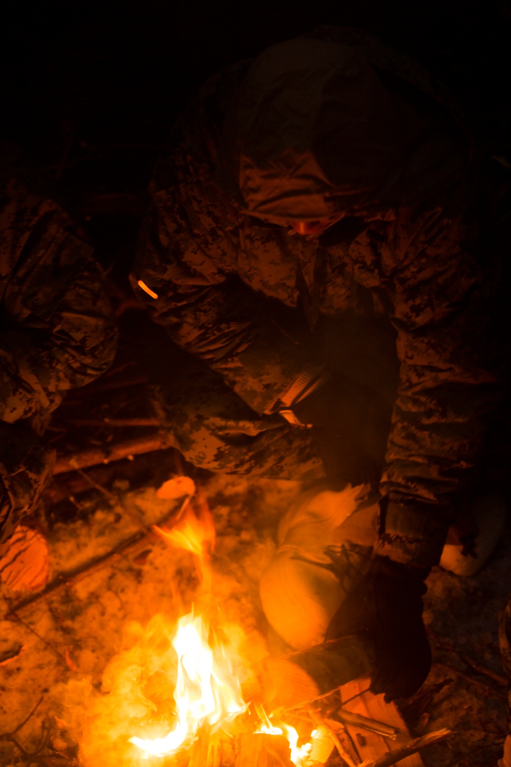 Marine Rotational Force Europe 17.1 practices fire-building