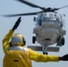 Royal Thai Navy helicopter conducts deck landing qualifications on the fligh deck of USS Green Bay