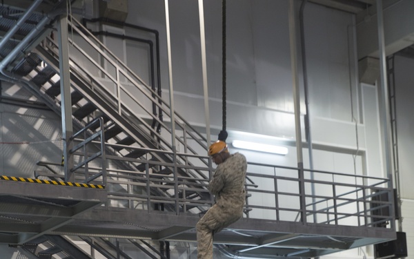 U.S. Marines practice water survival skills with Spanish allies