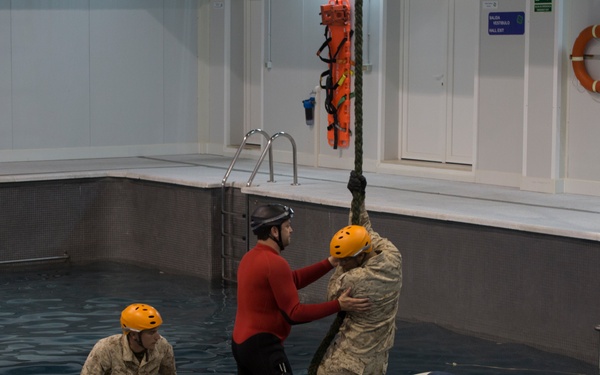 U.S. Marines practice water survival skills with Spanish allies