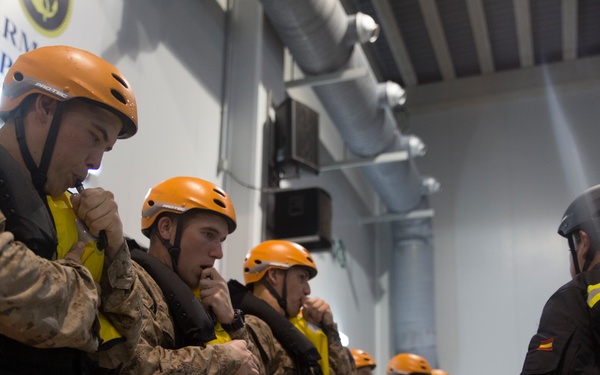 U.S. Marines practice water survival skills with Spanish allies