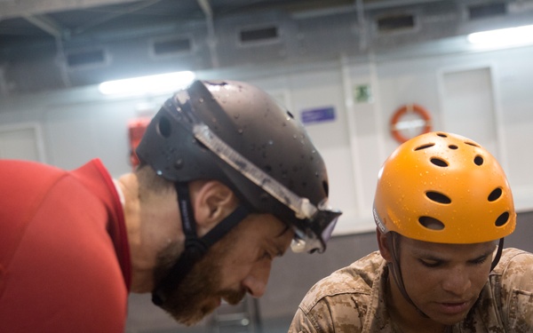 U.S. Marines practice water survival skills with Spanish allies