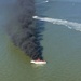 Coast Guard rescues 2 from burning boat