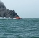 Fishing boat burns after Coast Guard rescues 4