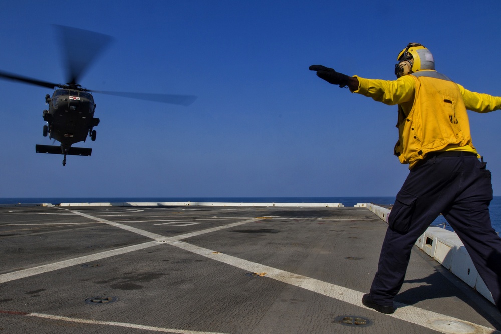 Army helicopters land on USS Green Bay during Exercise Cobra Gold