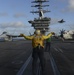 Nimitz Sailor directs aircraft