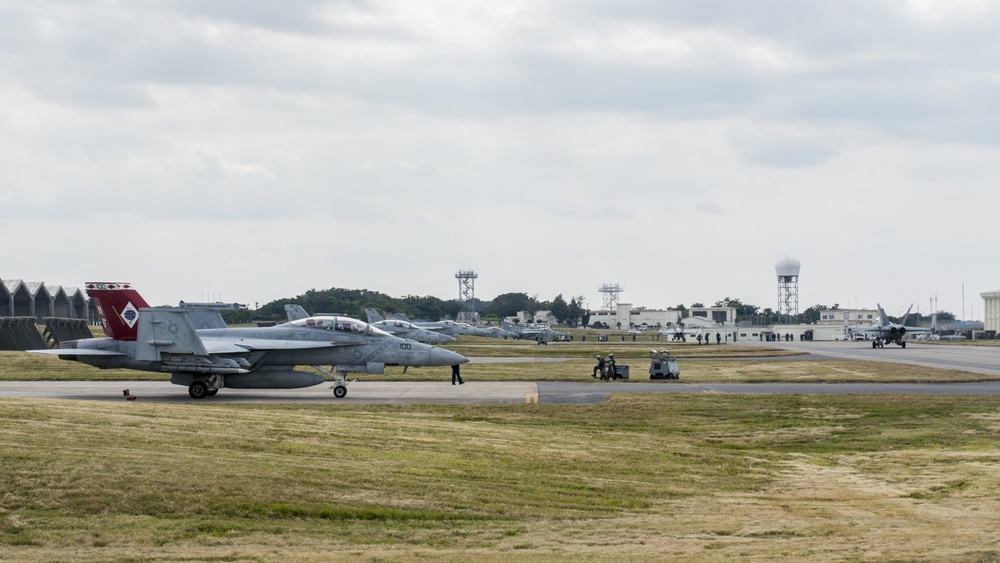 44th FS flies with Navy VFA-27 and VFA-102