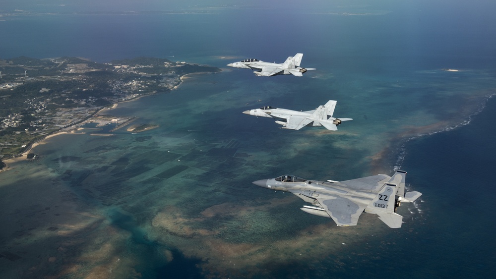 44th FS flies with Navy VFA-27 and VFA-102