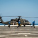 U.S. Army helicopters land on USS Greenbay