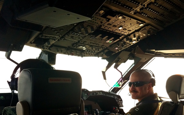 Lt. Alejandro Ravelo sits in the cockpit while flying on a P-1 exchange flight with the Japanese Maritime Self Defense Force (JMSDF) VP-3 “Sea Eagles”