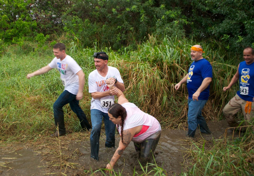 Swamp Romp competitors weather downpours, mud