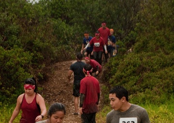 Swamp Romp competitors weather downpours, mud
