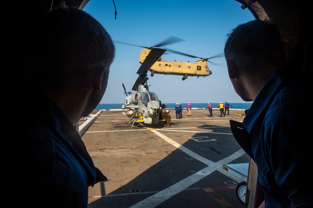 U.S. Army helicopters land on USS Greenbay