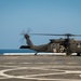 U.S. Army helicopters land on USS Greenbay