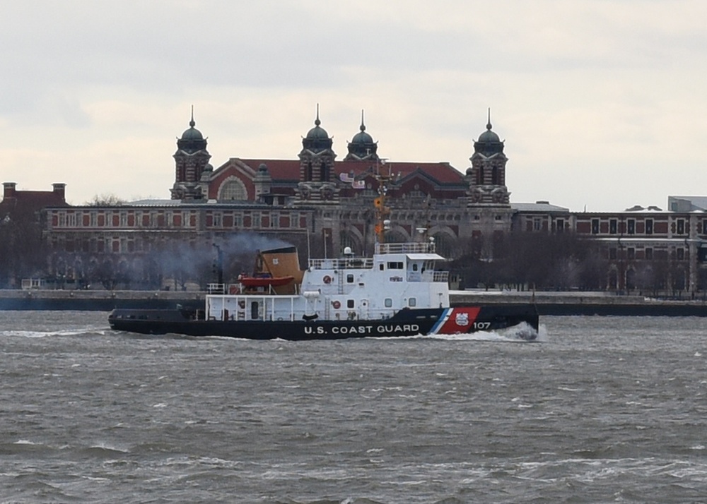 Coast Guard Cutter Penobscot Bay passes by Ellis Island