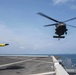U.S. Army lands helicopters on USS Green Bay’s flight deck during Cobra Gold