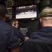 Sailors work in carrier air traffic control center