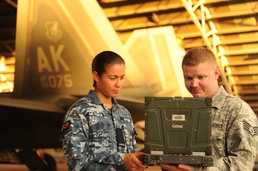 US, RAAF Airmen review F-22 safety procedures