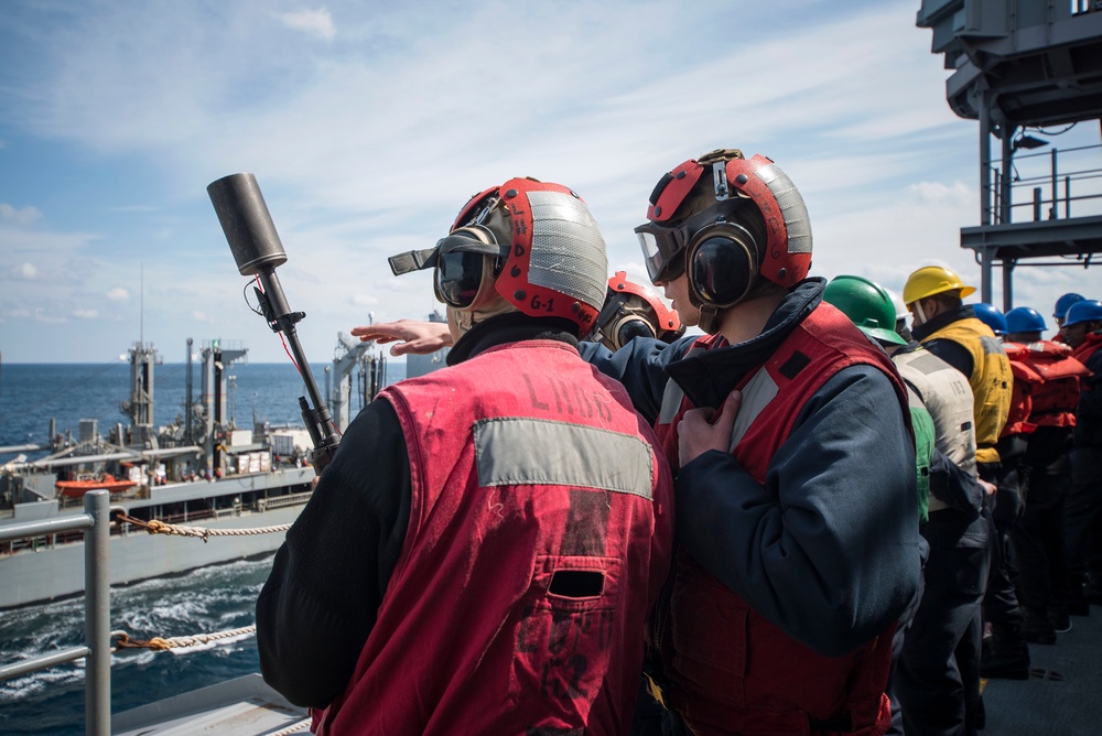 USS Bonhomme Richard (LHD 6) conducts replenishment at sea