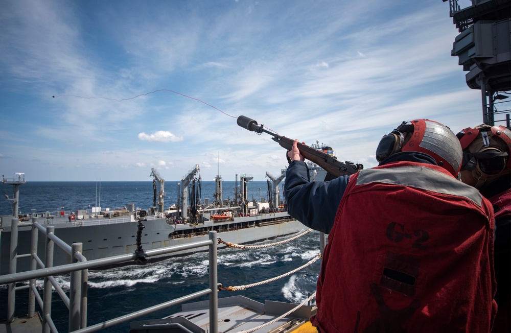 USS Bonhomme Richard (LHD 6) conducts replenishment at sea