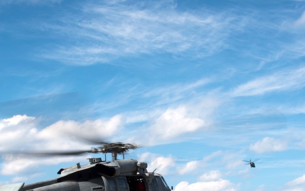 USS Bonhomme Richard (LHD 6) conducts replenishment at sea