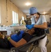 Honduran dentist performs dental work at the Continuing Promise 2017 (CP-17) medical site